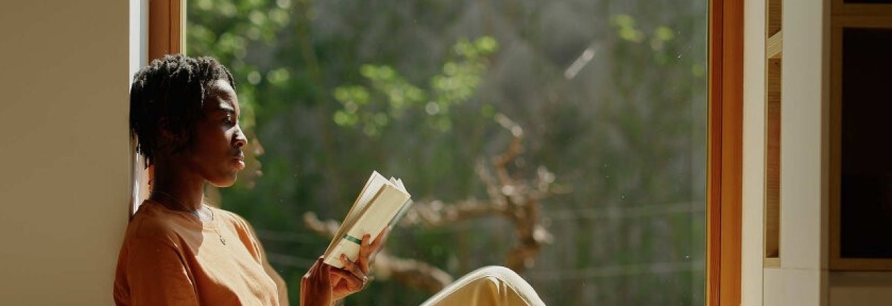 Reading by window